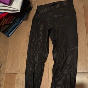 Black lululemon leggings size 4 never worn black shimmer